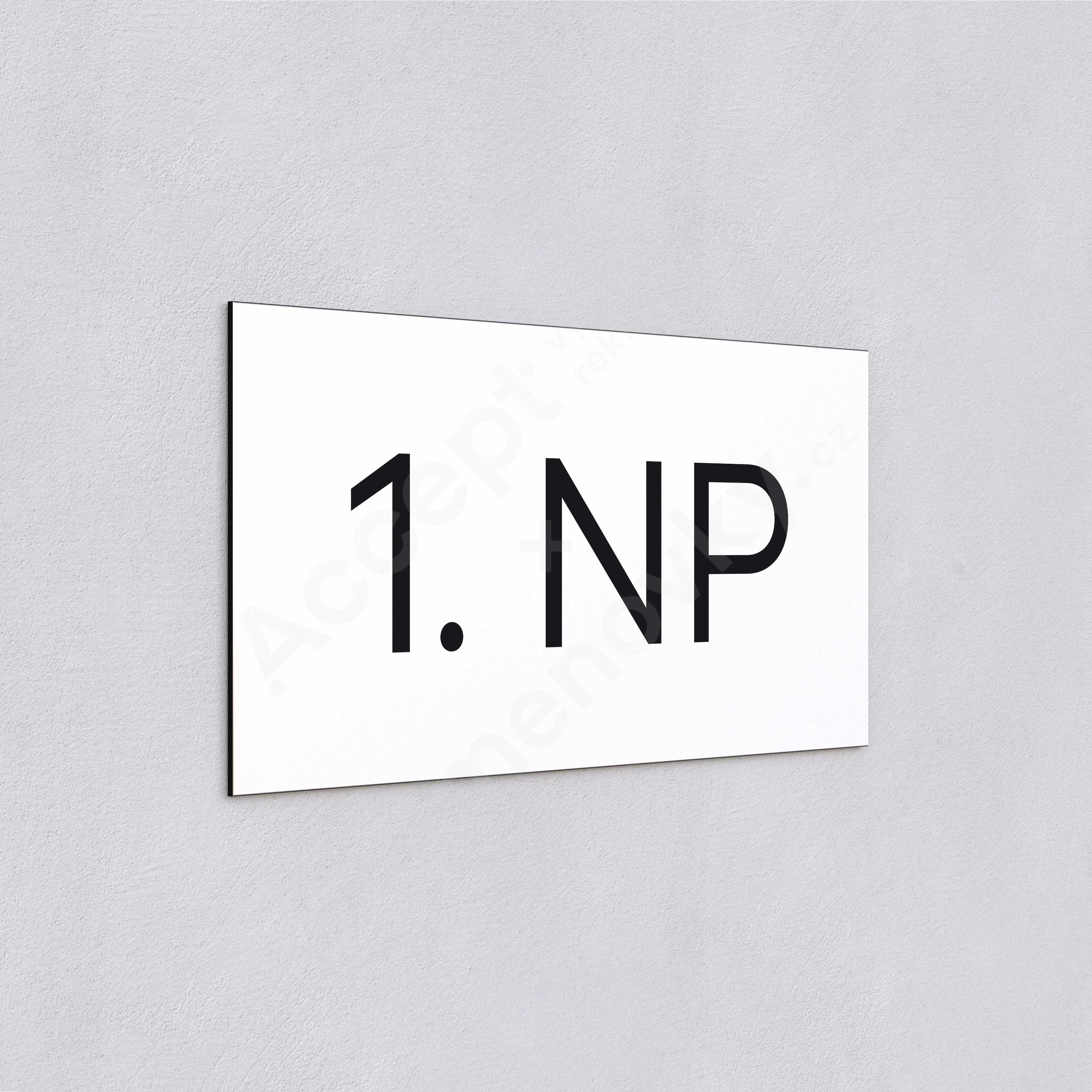 ACCEPT Označení podlaží "1. NP" (300 x 150 mm) - bílá tabulka - černý popis