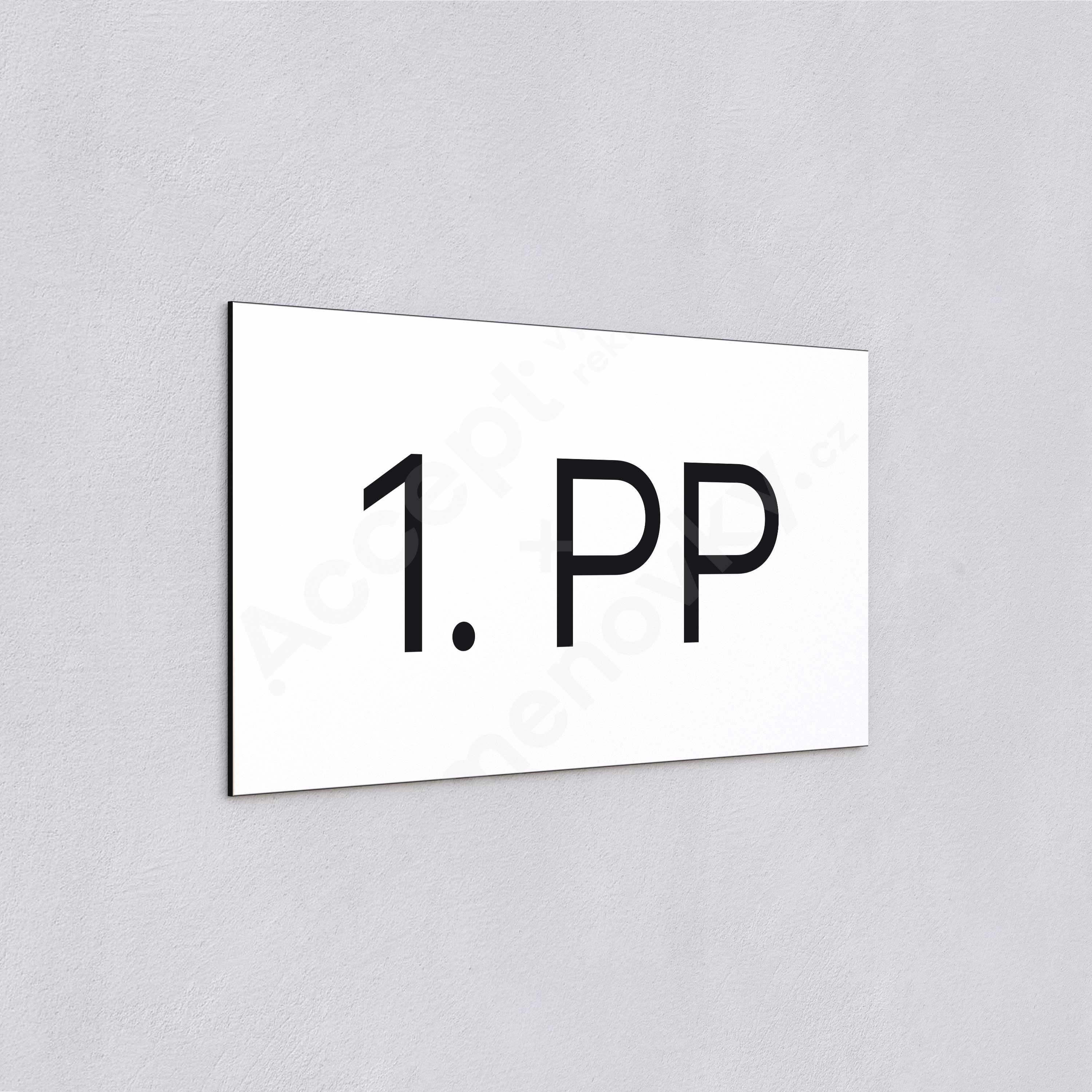 ACCEPT Označení podlaží "1. PP" (300 x 150 mm) - bílá tabulka - černý popis